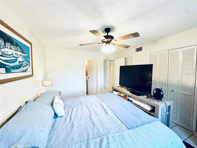 a bathroom with a toilet a sink and a mirror