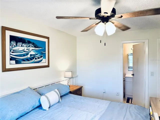 a view of a kitchen with furniture and cabinets