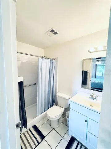 a street sign that is sitting on a road