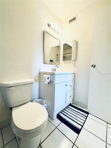 a view of a swimming pool with an outdoor seating