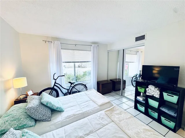 a view of swimming pool with outdoor seating