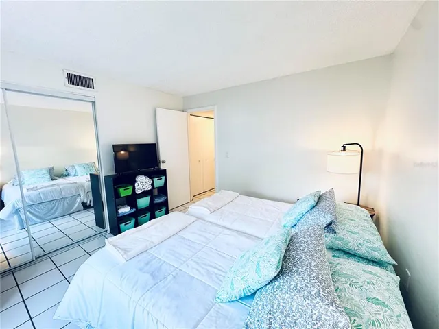 a view of a lake with sitting area