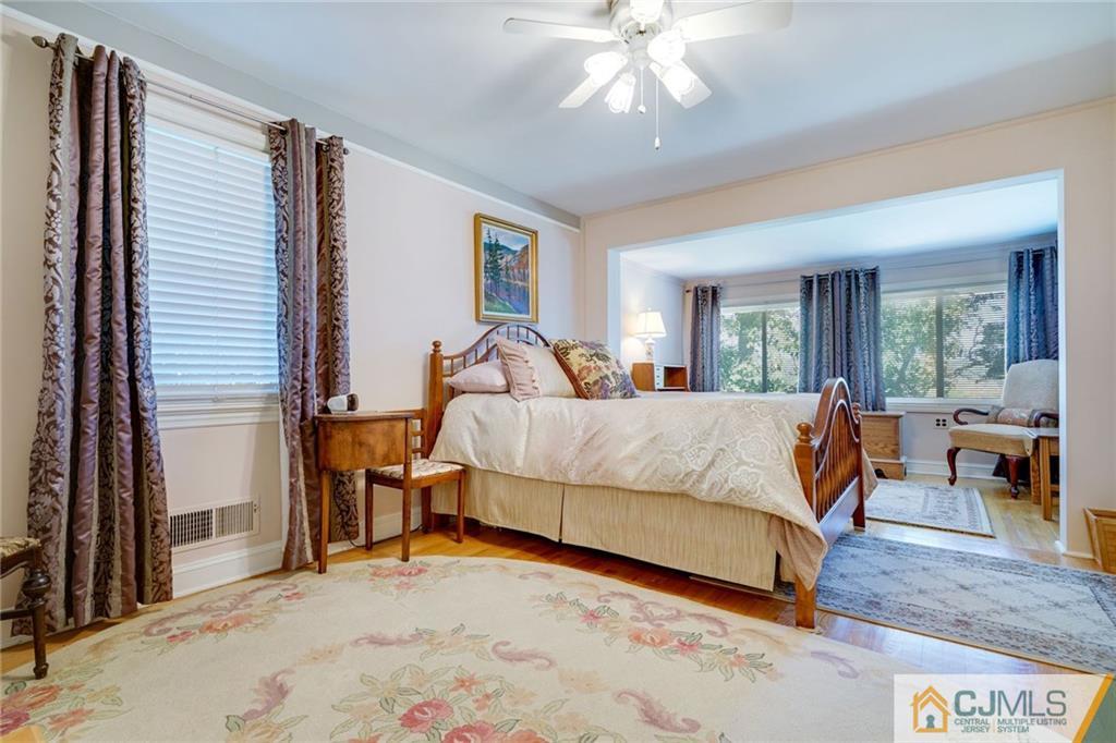 15 Carpender Road New Brunswick, NJ 08901 - Photo 16 of 25 a bedroom with a bed and window