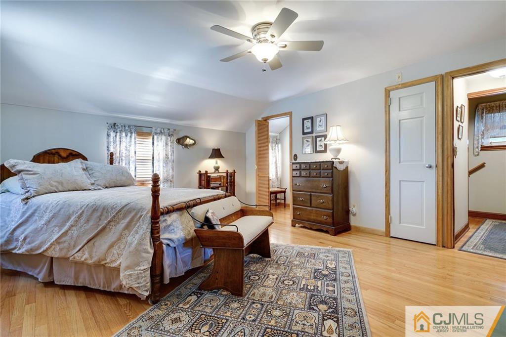 15 Carpender Road New Brunswick, NJ 08901 - Photo 18 of 25 a bedroom with furniture and wooden floor