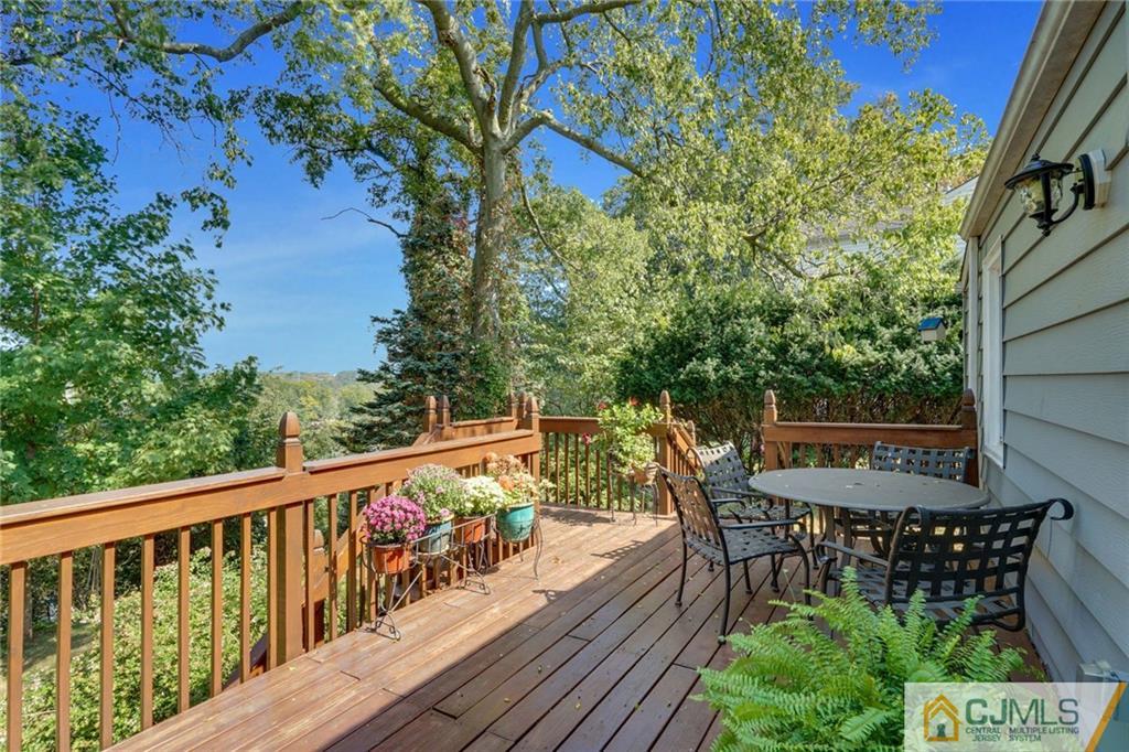 15 Carpender Road New Brunswick, NJ 08901 - Photo 20 of 25 a view of balcony with furniture and wooden deck