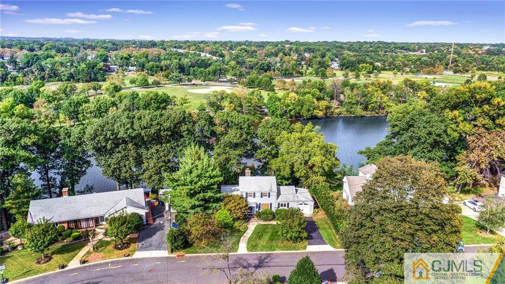 15 Carpender Road New Brunswick, NJ 08901 - Photo 3 of 25 an aerial view of residential houses with outdoor space and trees