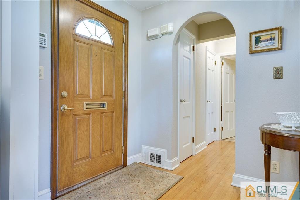 15 Carpender Road New Brunswick, NJ 08901 - Photo 4 of 25 a view of front door with hallway