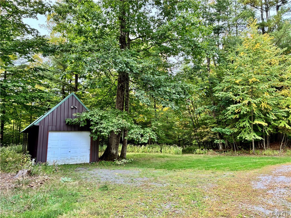 2676 County Rte 22 Orwell, NY 13144 - Photo 5 of 32 Mature trees frame a useful detached outbuilding t