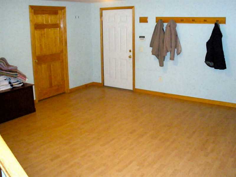 104 Colvintown Road Coventry, RI 02816 - Photo 19 of 25 Den/Family/Great Room. Finished basement area.