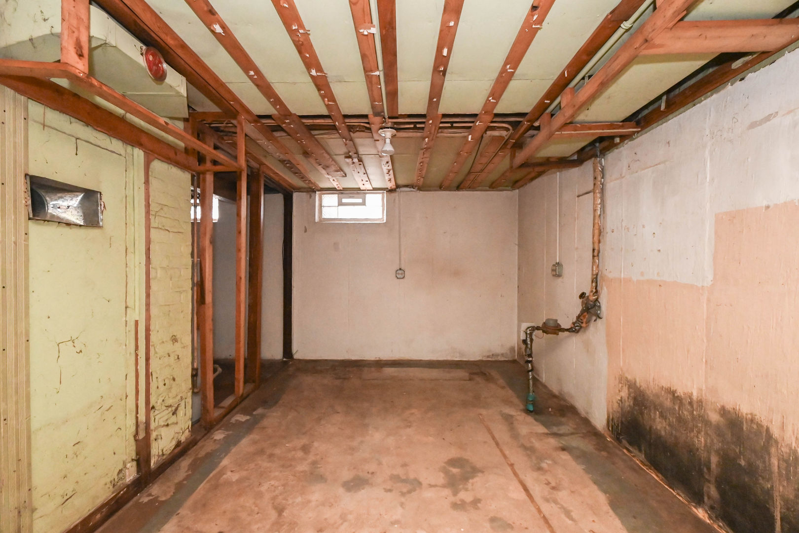 629 Fulton Avenue Waukegan, IL 60085 - Photo 14 of 25 a view of a room with wooden walls
