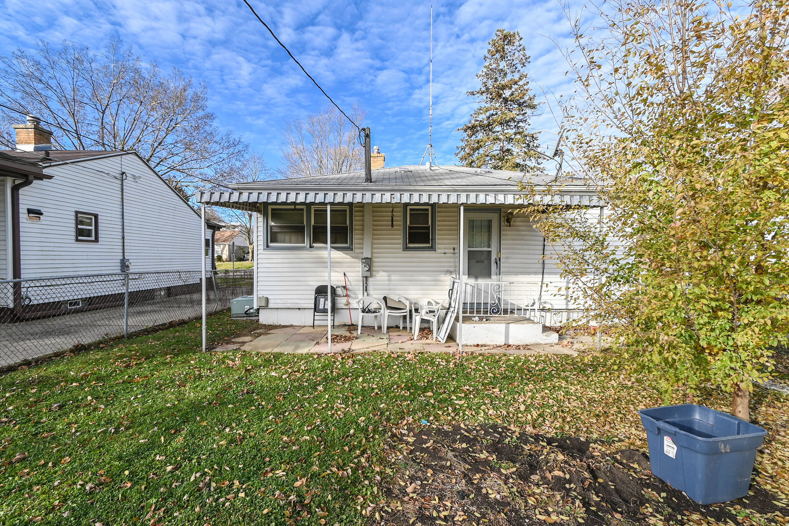 629 Fulton Avenue Waukegan, IL 60085 - Photo 20 of 25 a front view of a house with garden