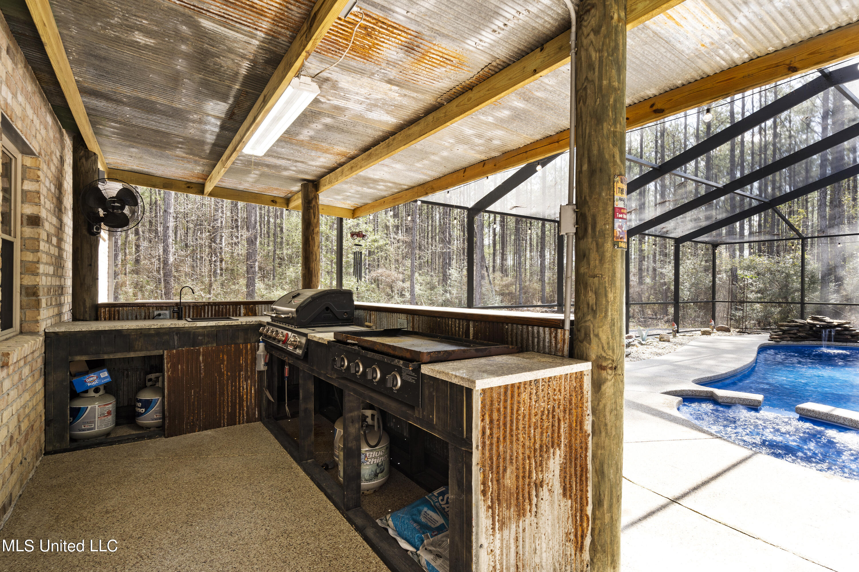 1189 Grain Elevator Road Lucedale, MS 39452 - Photo 22 of 44 outdoor kitchen w/gas grill and griddle