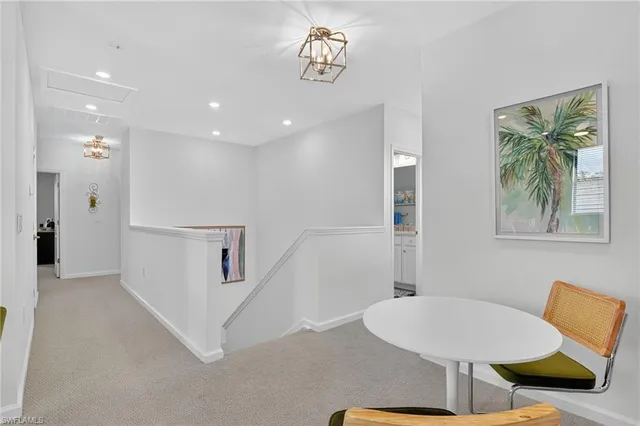 a workspace with furniture and bathroom