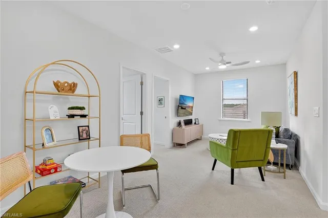 a bathroom with a sink a toilet and shower curtain