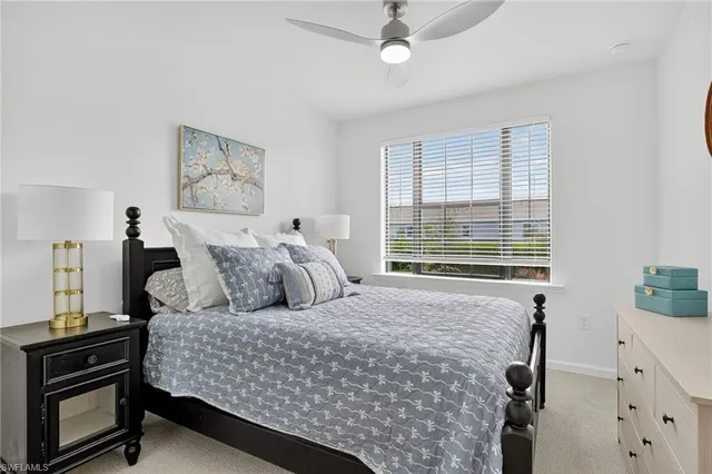 a spacious bathroom with a double vanity sink shower and mirror