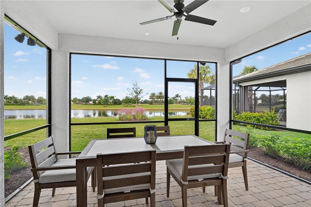 1657 Serena Avenue Naples, FL 34120 - Photo 27 of 40 a view of a dining room with furniture window and outside view