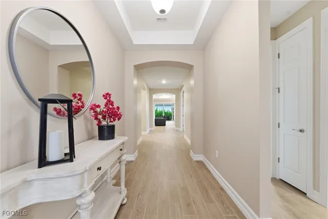 a view of entryway with wooden floor