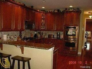 24907 Reeds Pointe Drive, Unit 13 Novi, MI 48374 - Photo 7 of 23 Gourmet Kitchen