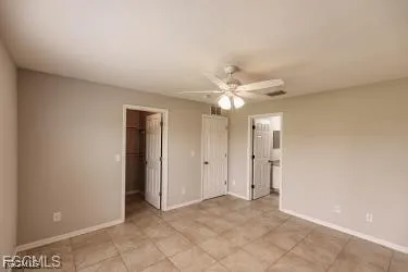 a view of a kitchen with a stove cabinets and a kitchen island