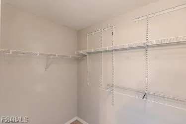 a view of an empty walk in closet