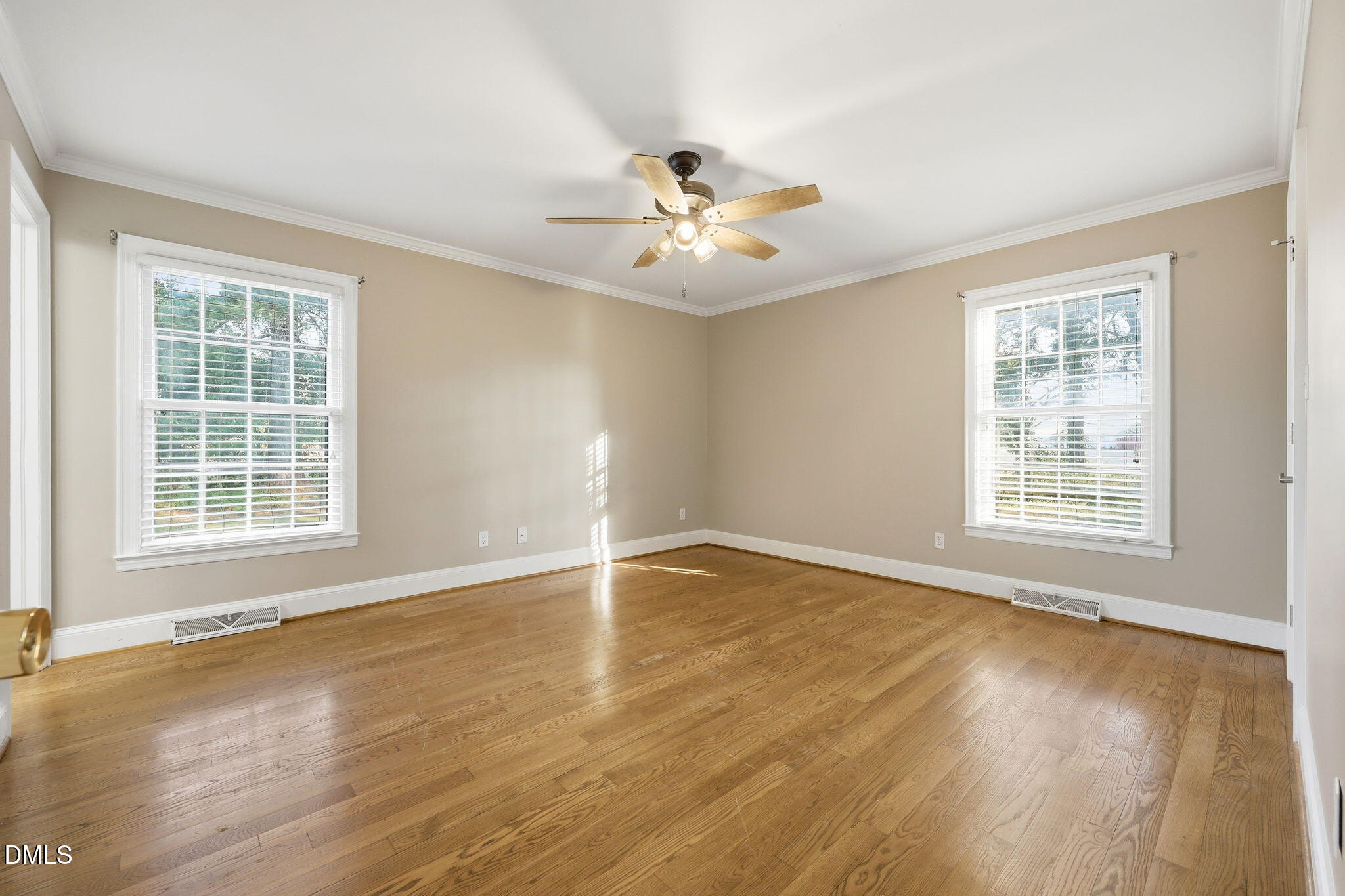 1130 Prospect Church Road Dunn, NC 28334 - Photo 37 of 47 wooden floor in an empty room with a window