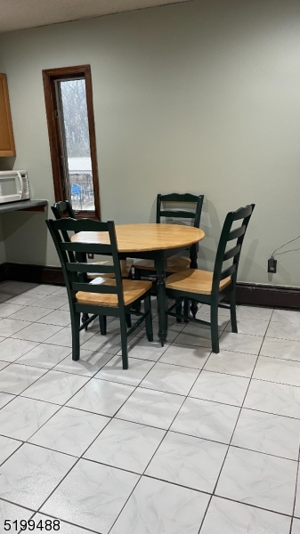 78 Quakertown Road Pittstown, NJ 08867 - Photo 2 of 10 a view of a workspace with furniture