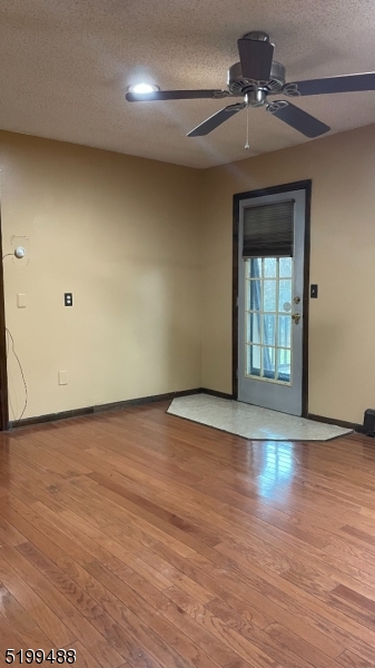 78 Quakertown Road Pittstown, NJ 08867 - Photo 9 of 10 wooden floor in an empty room with a window