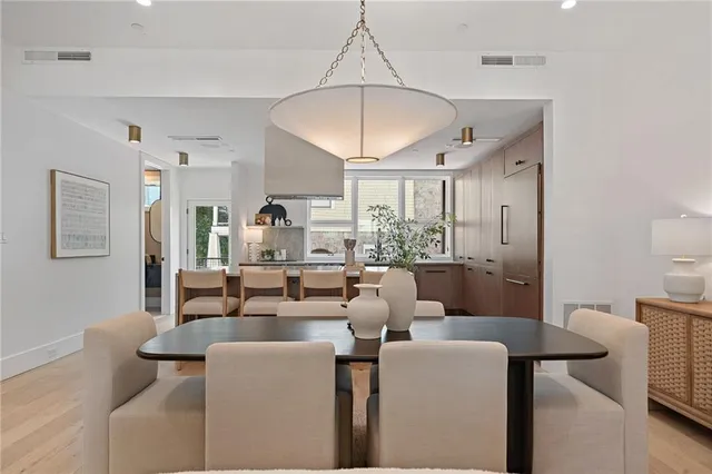 a kitchen with a stove and a table