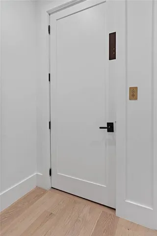 a bathroom with a granite countertop sink mirror and double