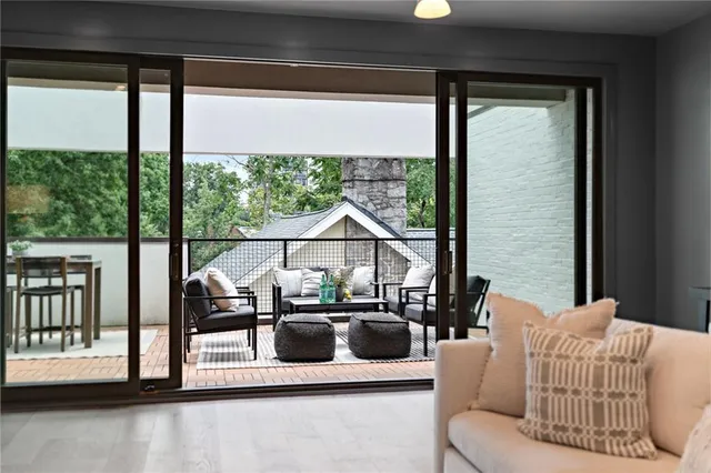 an aerial view of multiple houses with yard