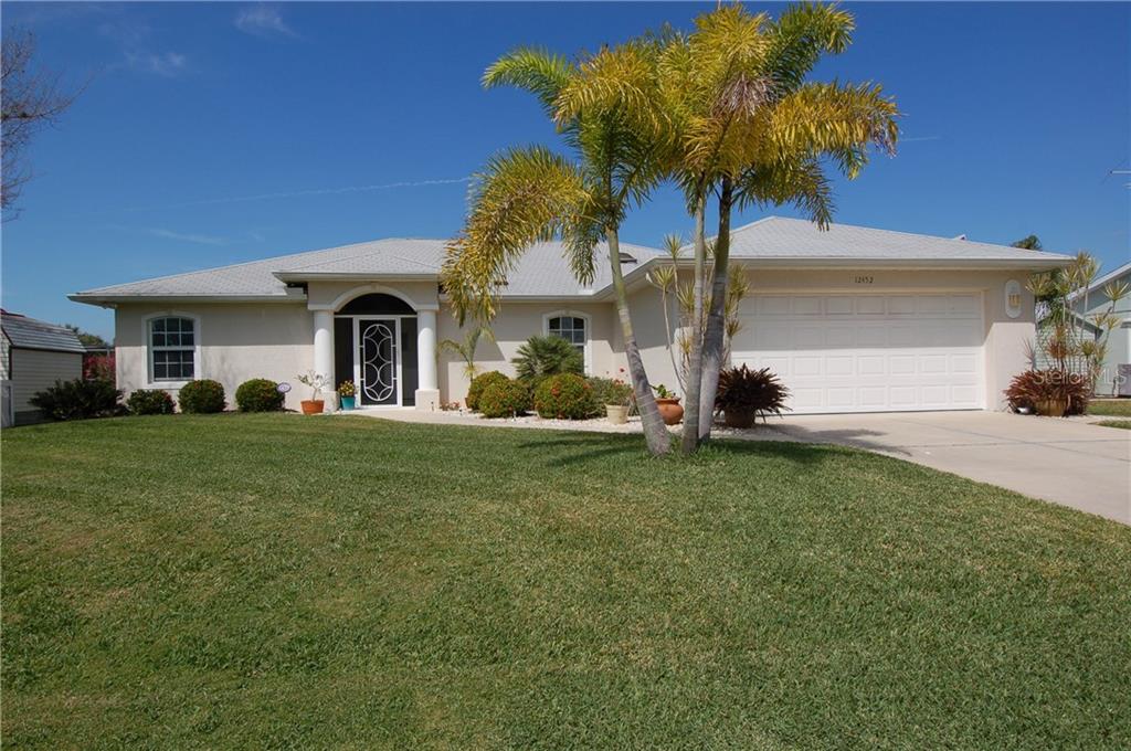 12452 Bacchus Road Port Charlotte, FL 33981 - Photo 1 of 1 Water Front Pool Home