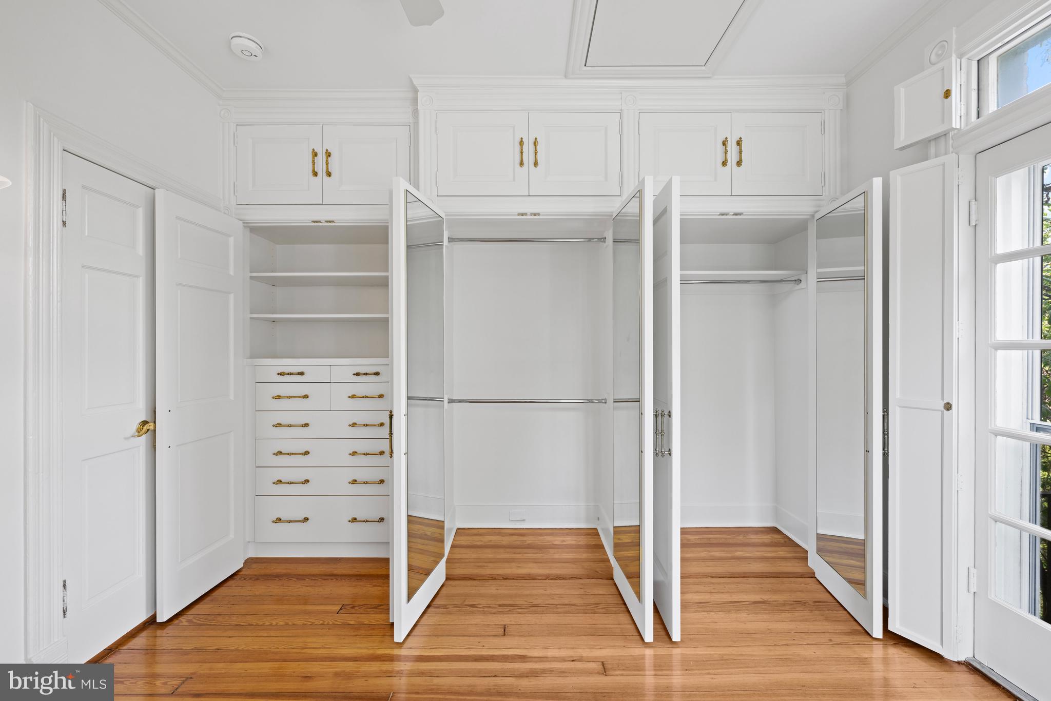 1423 34th Street Northwest Washington, DC 20007 - Photo 14 of 30 a kitchen with stainless steel appliances a refrigerator and cabinets