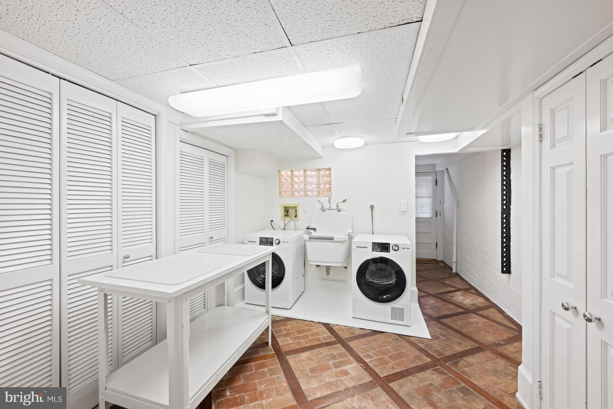 1423 34th Street Northwest Washington, DC 20007 - Photo 23 of 30 a view of a kitchen with a sink furniture and entryway