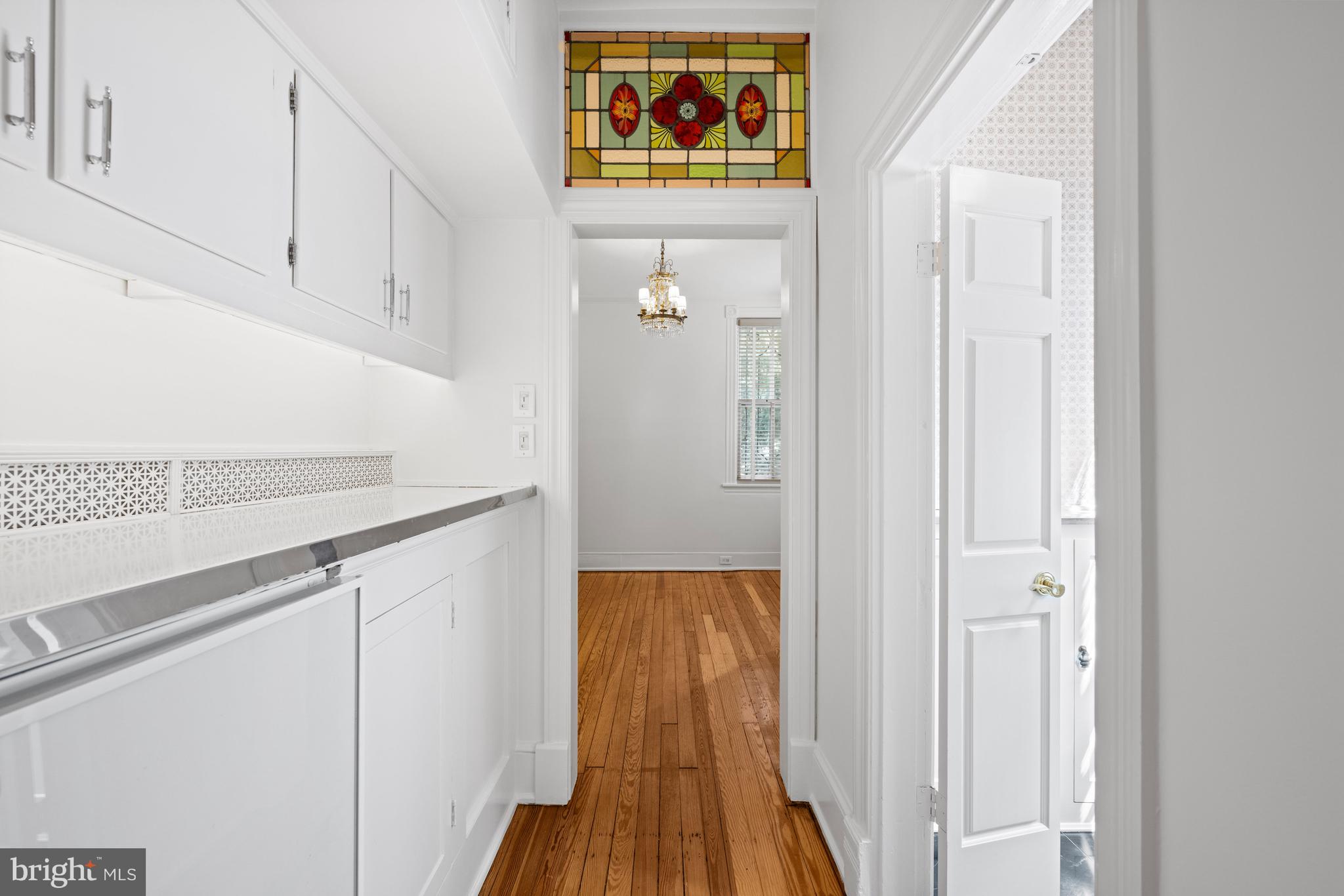 1423 34th Street Northwest Washington, DC 20007 - Photo 5 of 30 a view of hallway with wooden floor