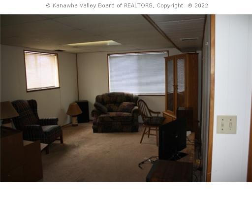Den/Family/Great Room. Lower level offers a family room and rec room
