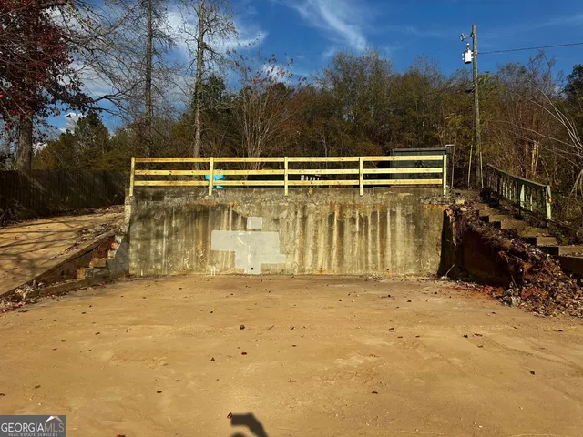 a view of a yard covered in snow