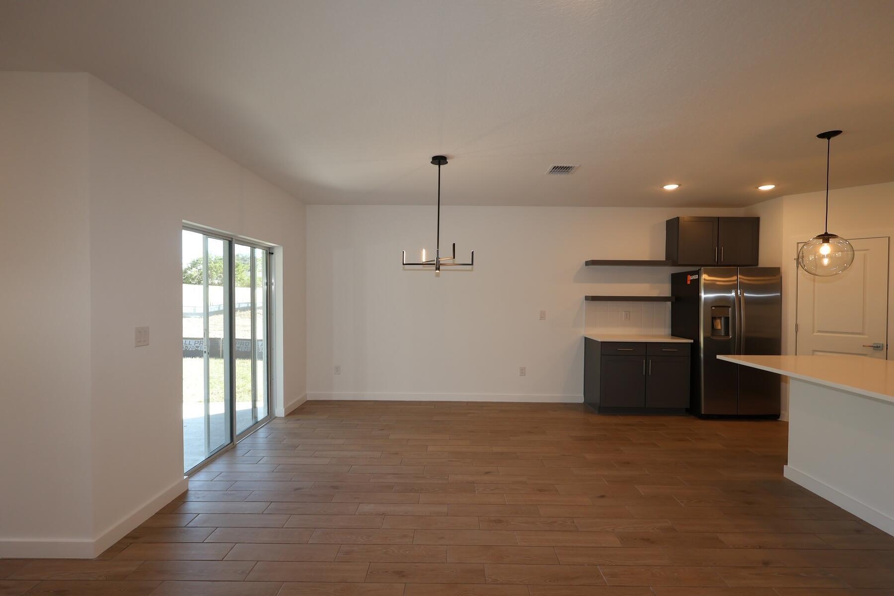 2923 Triangle Road Palm Bay, FL 32909 - Photo 7 of 12 PALM BAY DINING ROOM