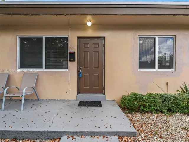 a view of a door front of a house