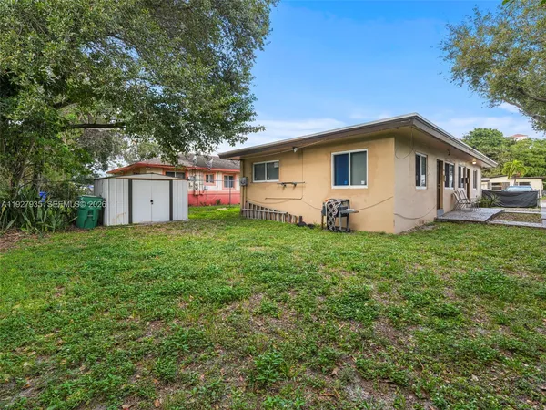 a house view with a garden space