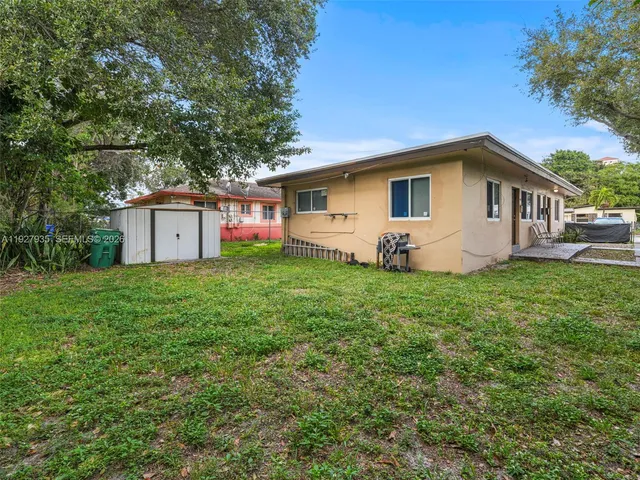a house view with a garden space
