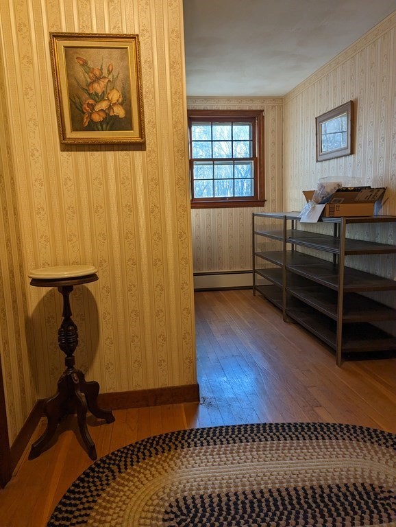 34 Colonial Road Sutton, MA 01590 - Photo 13 of 34 a living room with a furniture and a window
