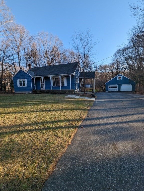34 Colonial Road Sutton, MA 01590 - Photo 2 of 34 a view of a house with a yard
