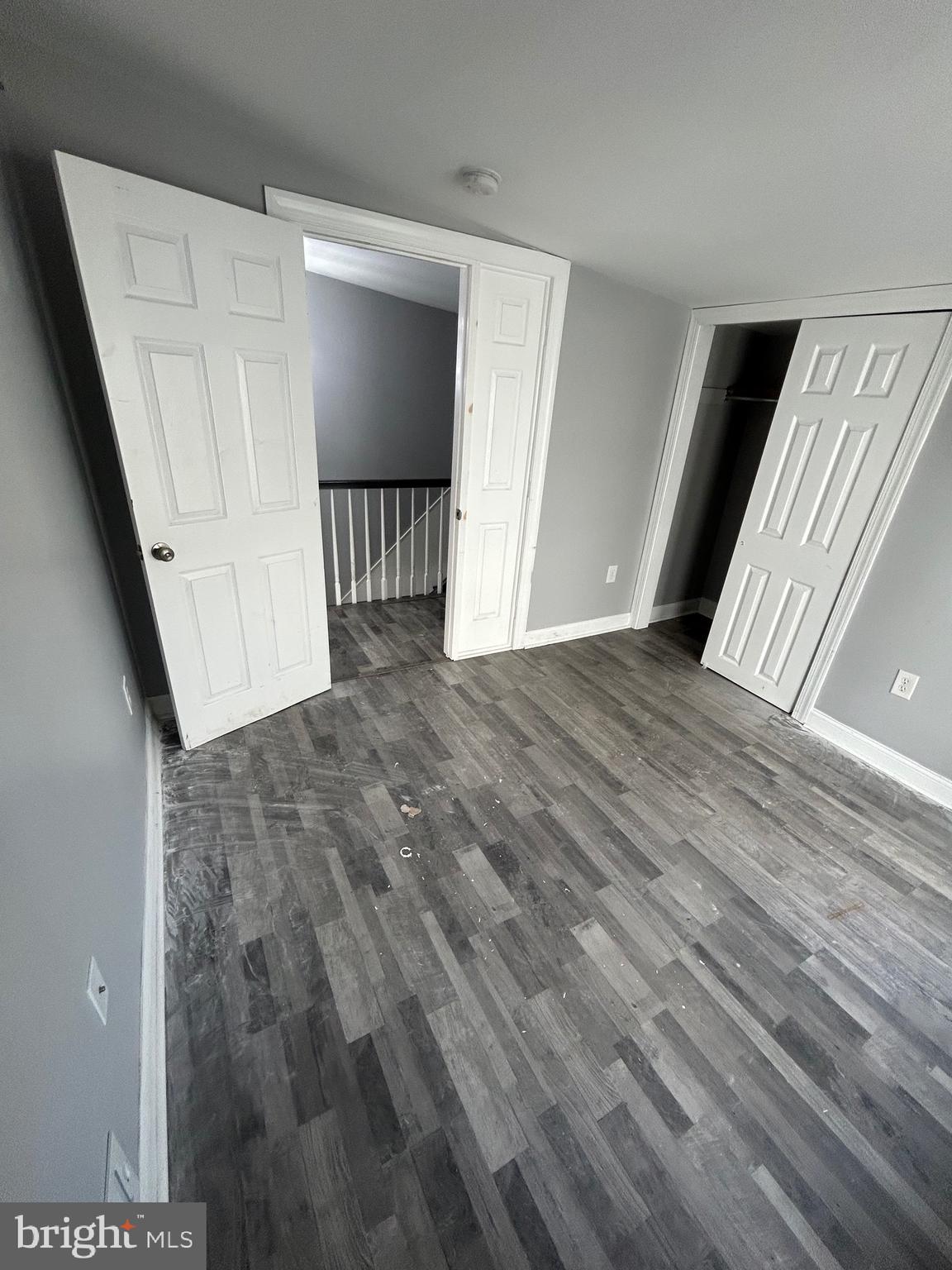 425 Main Street Royersford, PA 19468 - Photo 12 of 17 a view of an empty room with wooden floor and stairs