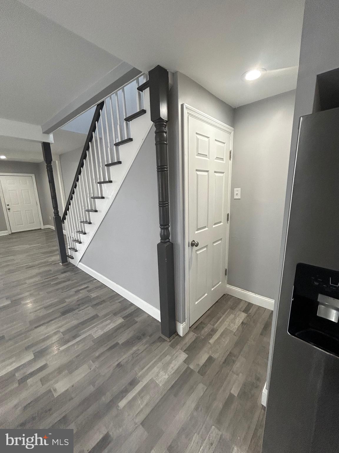 425 Main Street Royersford, PA 19468 - Photo 7 of 17 a view of hallway with stairs and wooden floor