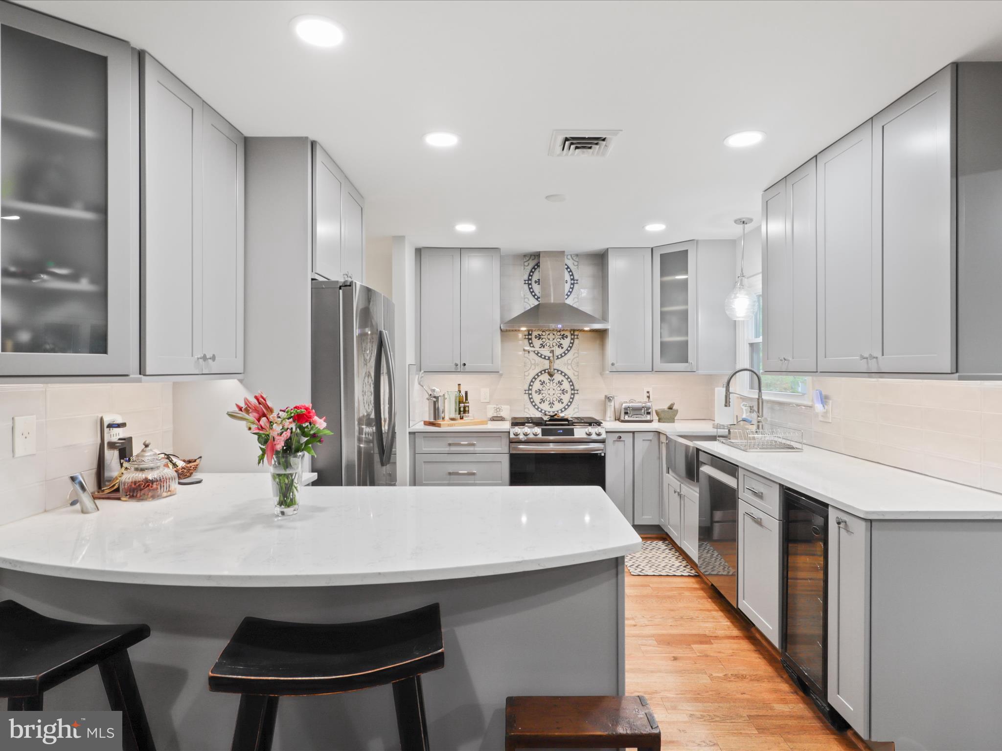 800 Williamsburg Road Sterling, VA 20164 - Photo 18 of 46 a kitchen with stainless steel appliances a sink and stove
