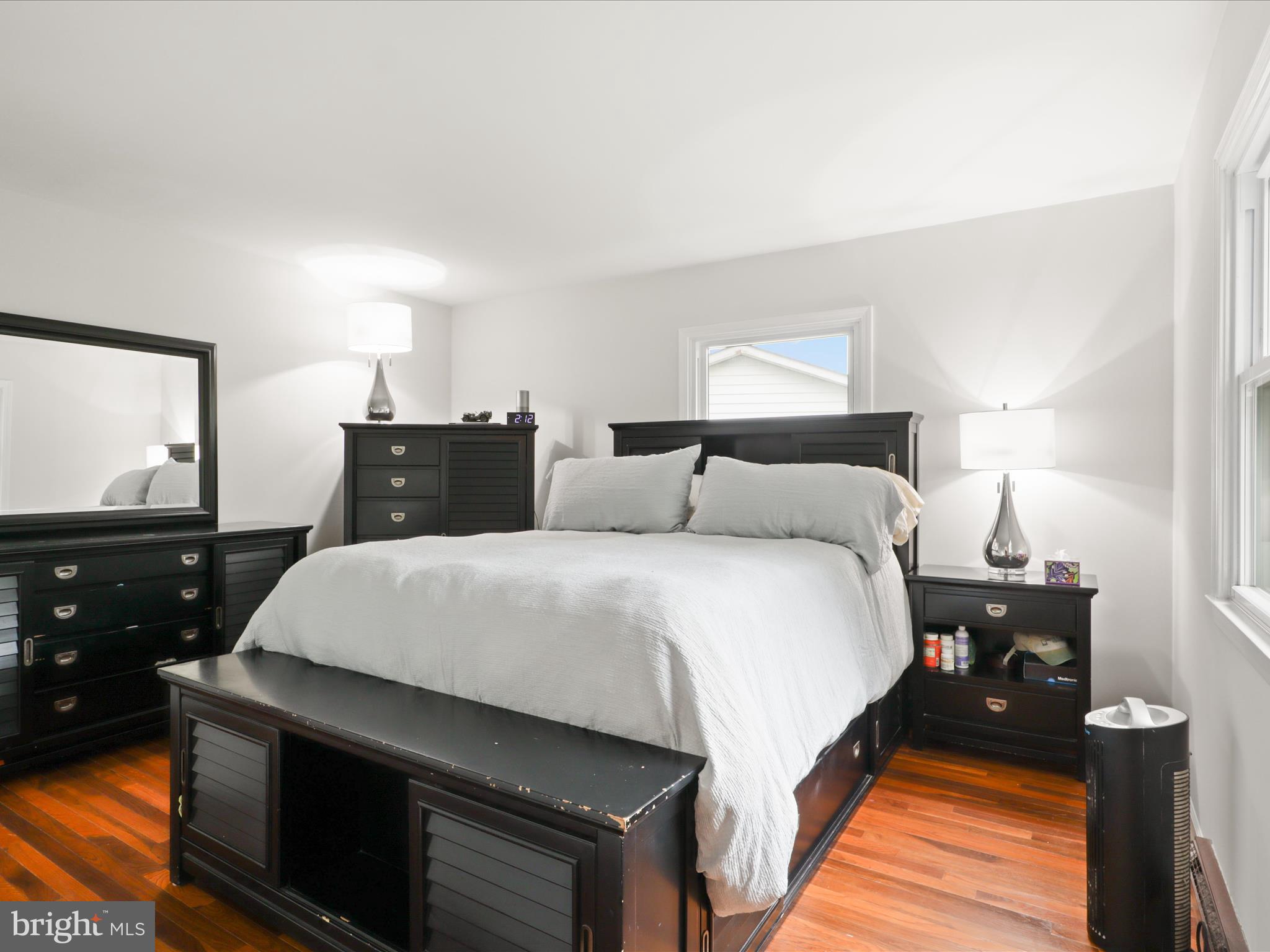 800 Williamsburg Road Sterling, VA 20164 - Photo 21 of 46 a bedroom with a bed and a tv on the dresser