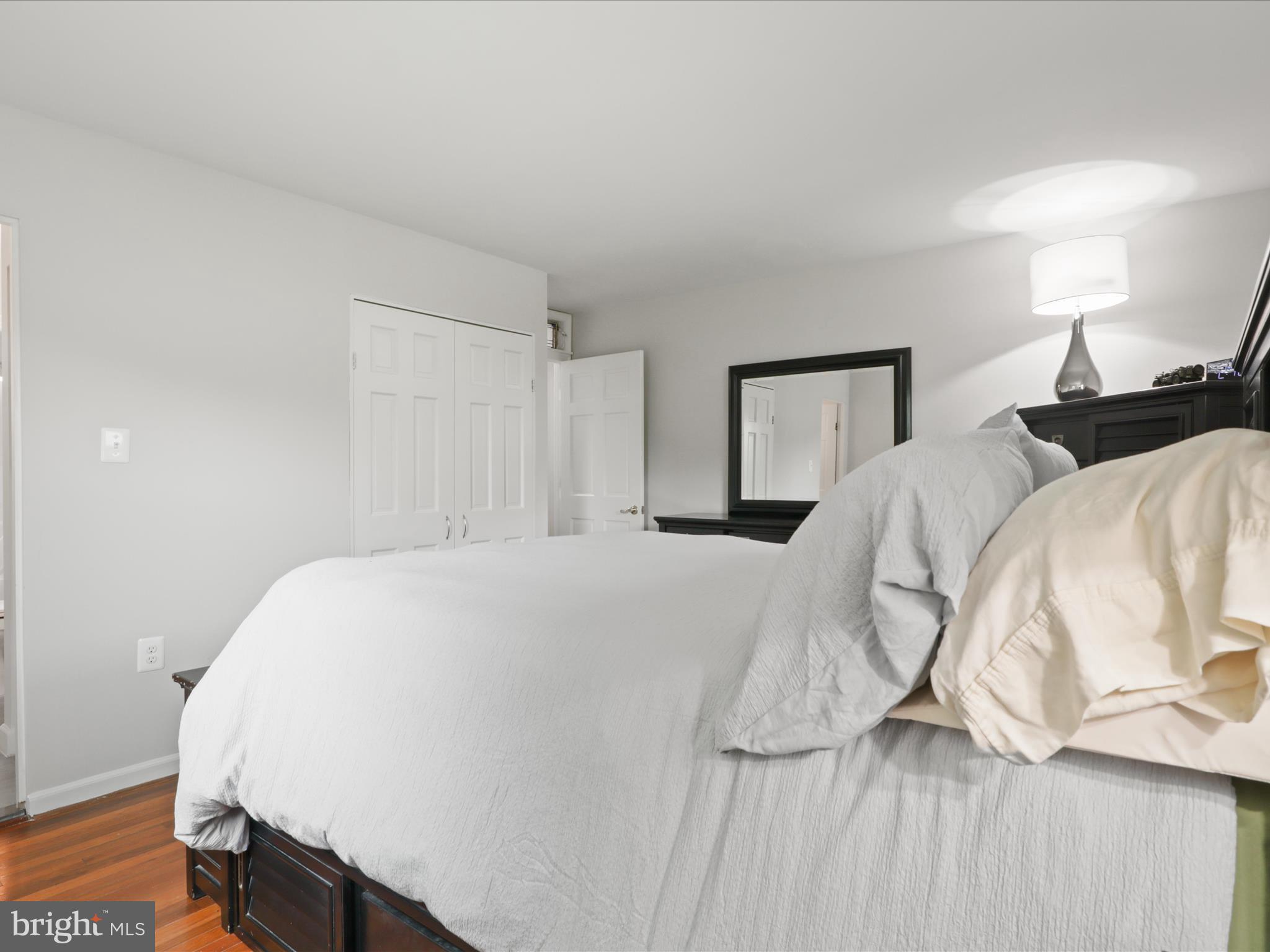 800 Williamsburg Road Sterling, VA 20164 - Photo 22 of 46 a bed room with a bed and a night stand