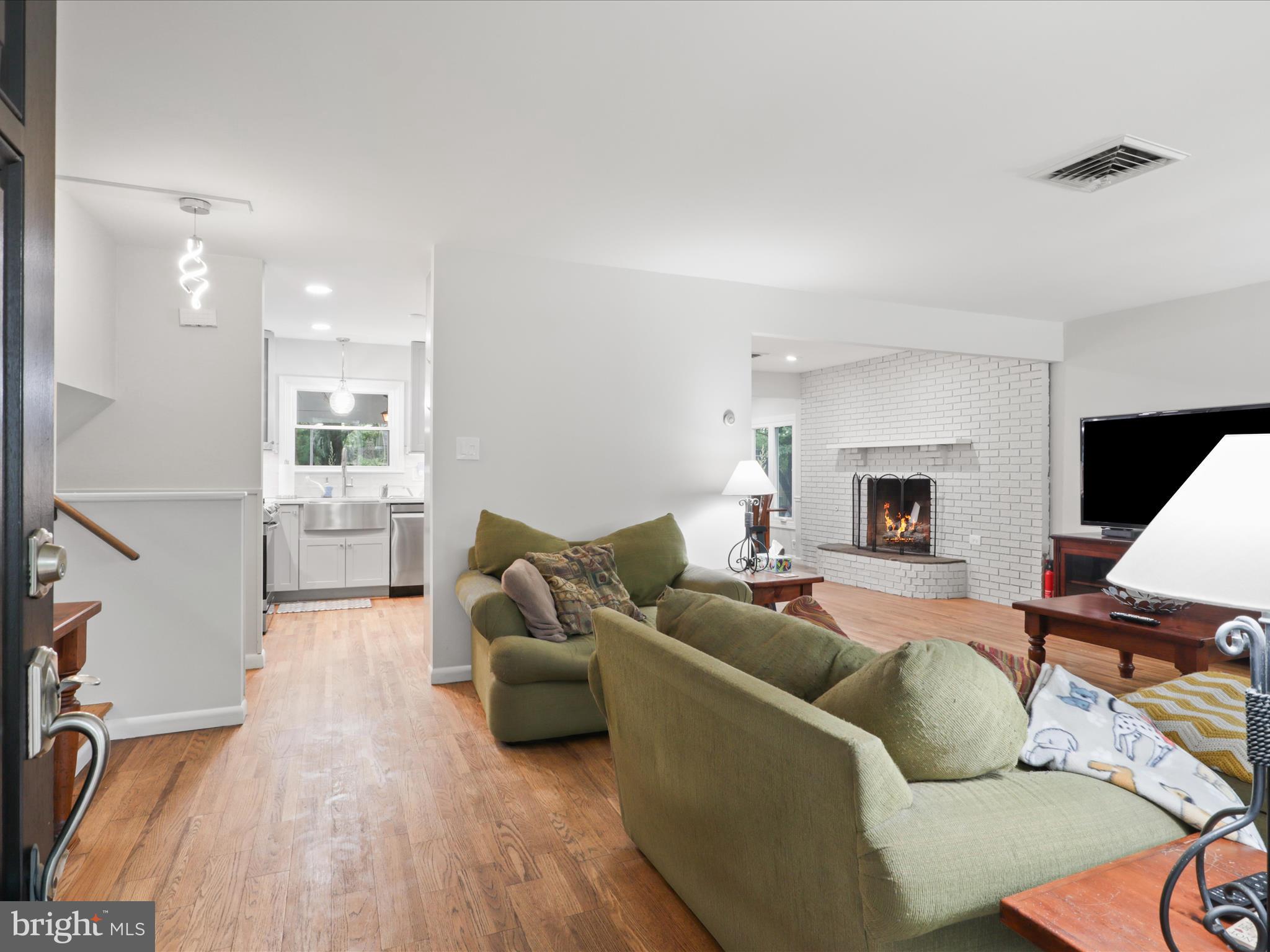 800 Williamsburg Road Sterling, VA 20164 - Photo 5 of 46 a living room with furniture and a couch