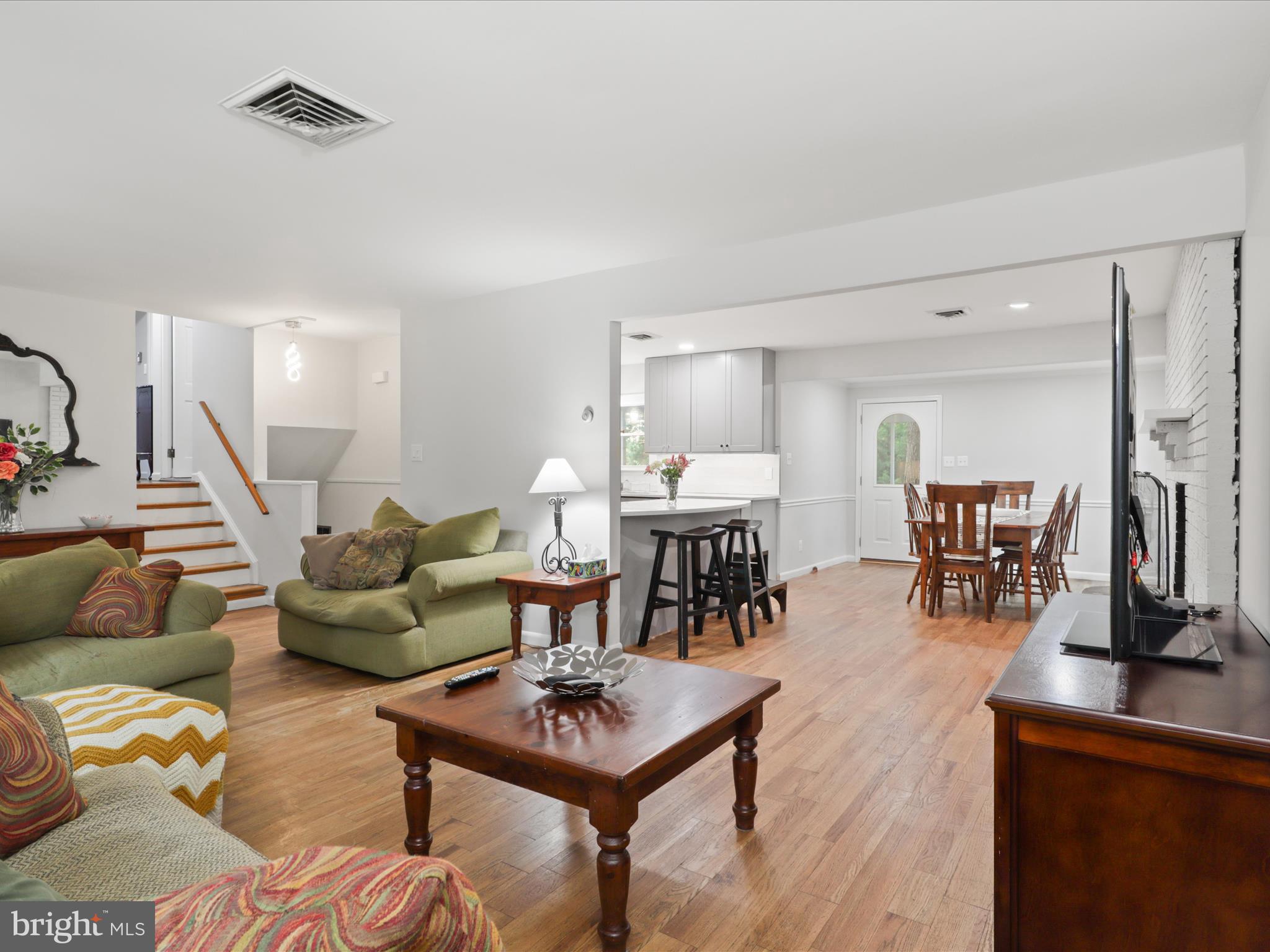 800 Williamsburg Road Sterling, VA 20164 - Photo 9 of 46 a living room with furniture and a table