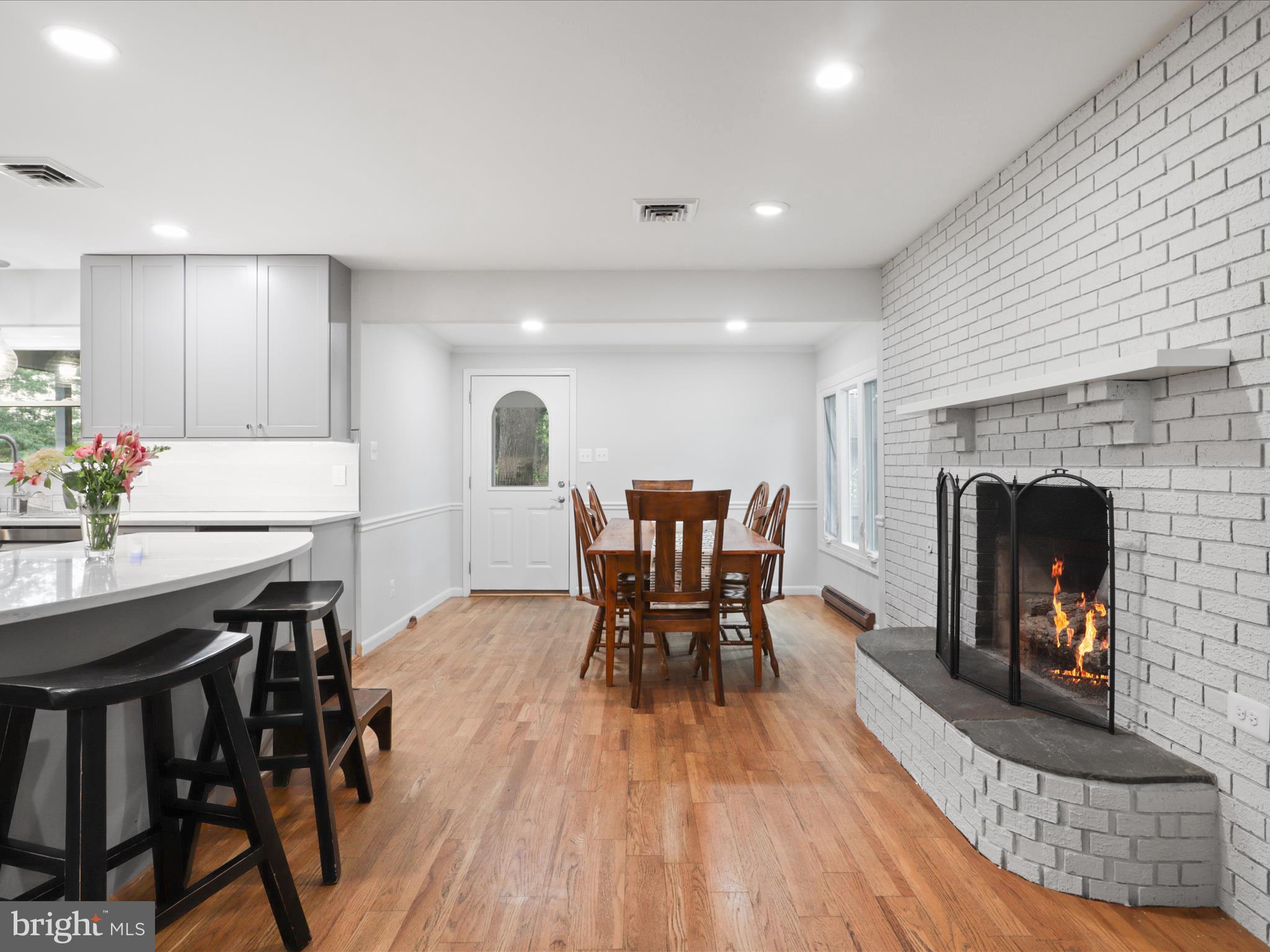 800 Williamsburg Road Sterling, VA 20164 - Photo 10 of 46 a living room with furniture and a fireplace